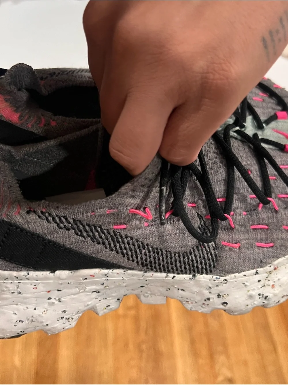 Nike Women's Gray Knit Sneakers with Pink Highlights